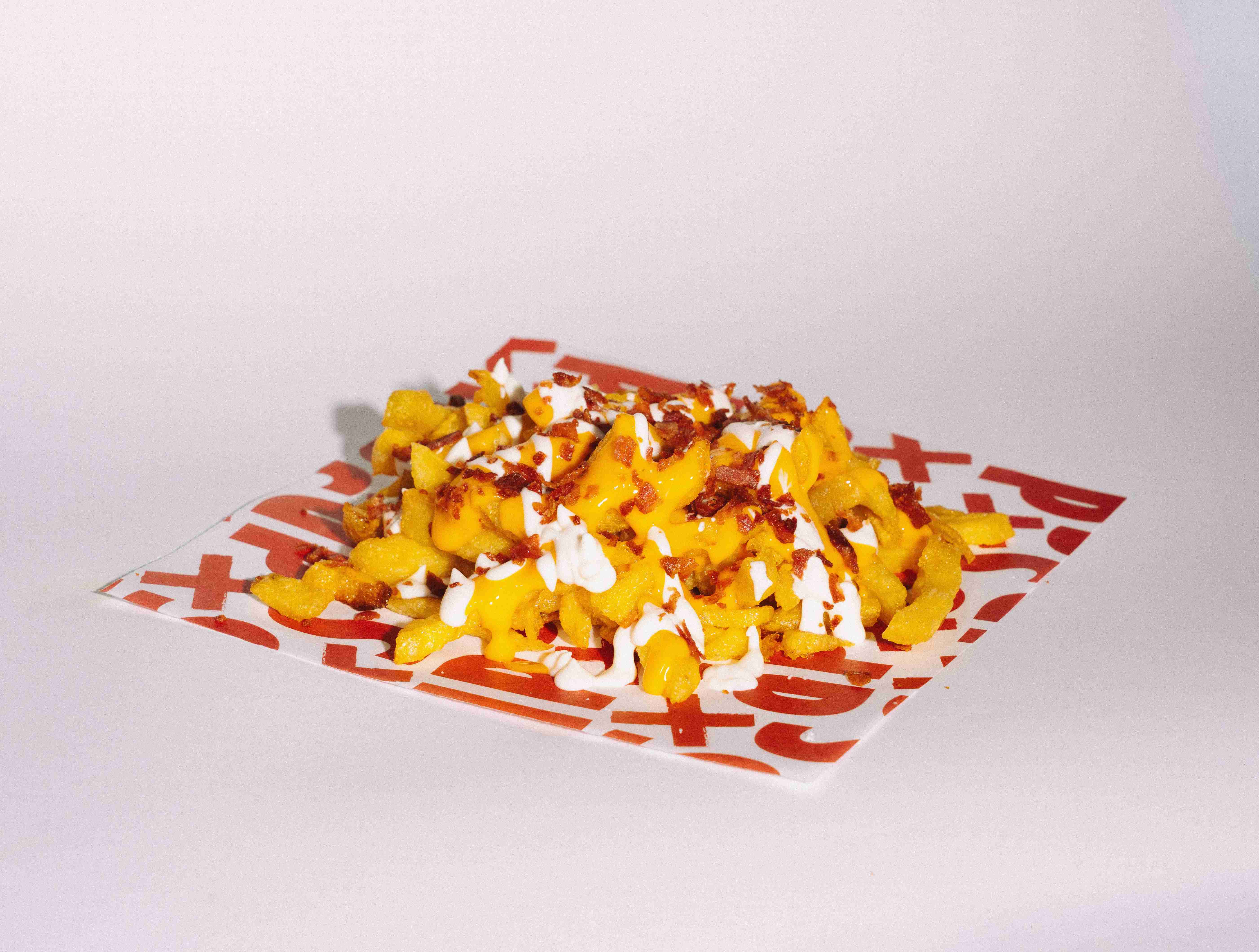 Patatas con chedar y bacon
