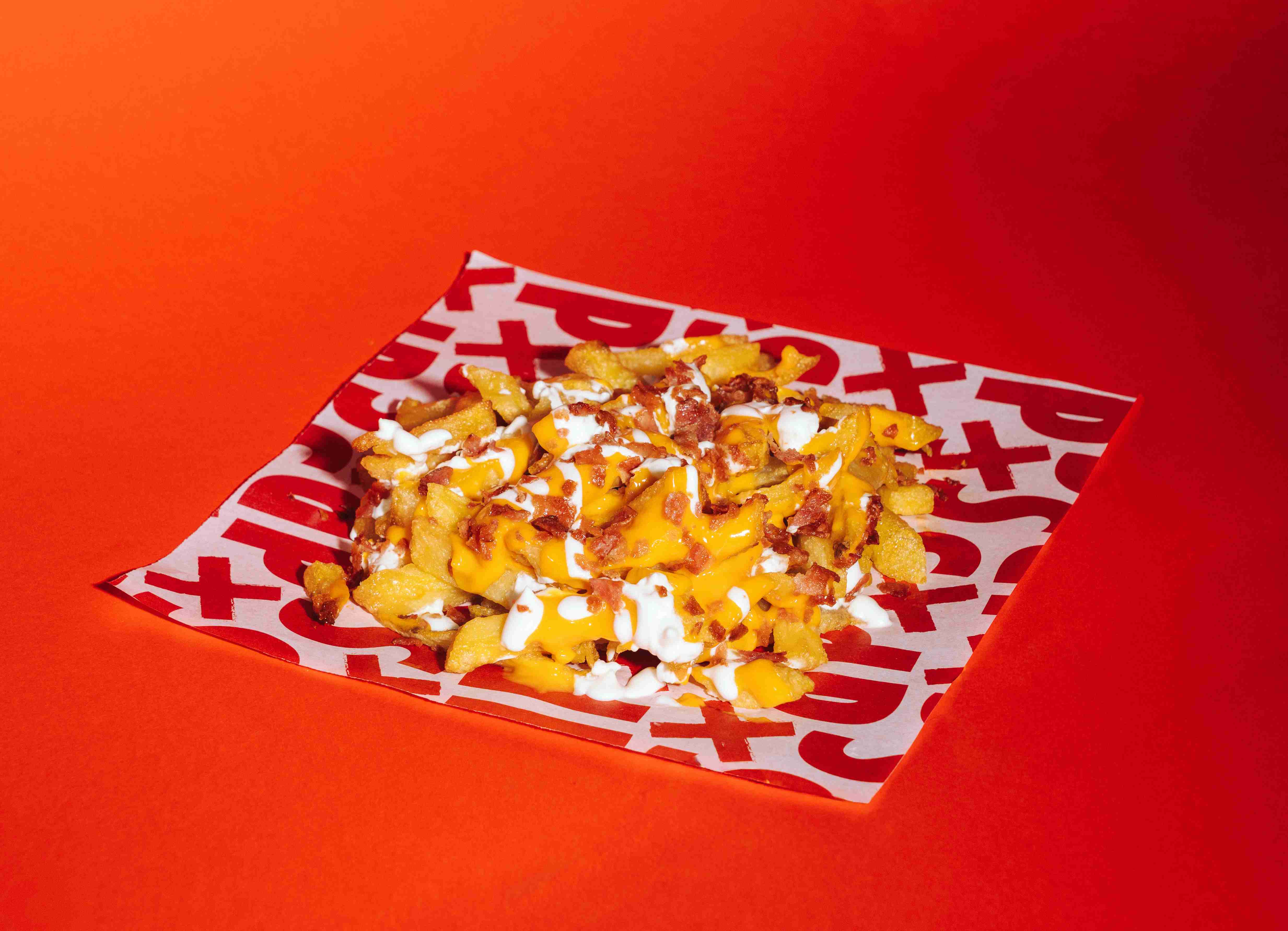 Patatas con chedar y bacon